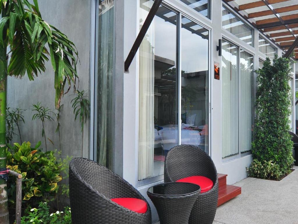 Phu Nana Boutique Hotel - Sha Plus Rawai Rum bild